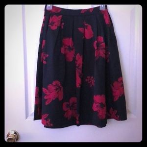 Knee length black and red floral a-line skirt